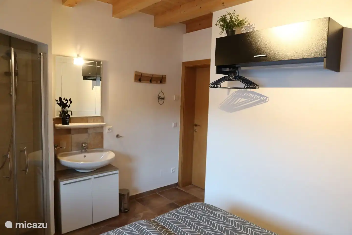 Bedroom 2 with private shower and washing facilities