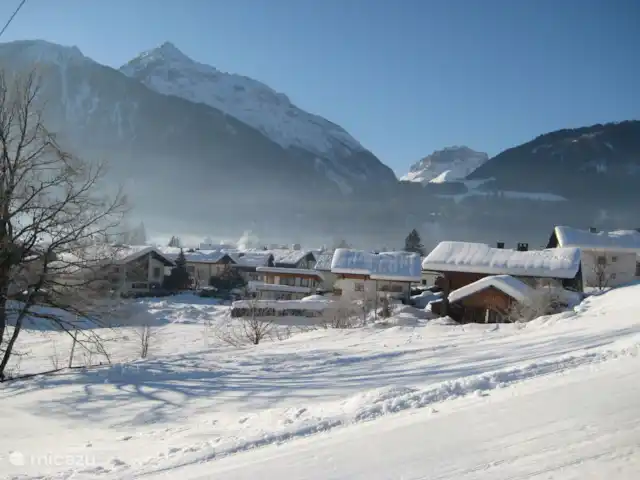 Chalet Giusto aan de Piste 6 pers. huren in Oostenrijk, Karinthië, Kötschach-Mauthen - villa Uitzicht vanaf het balkon in de winter