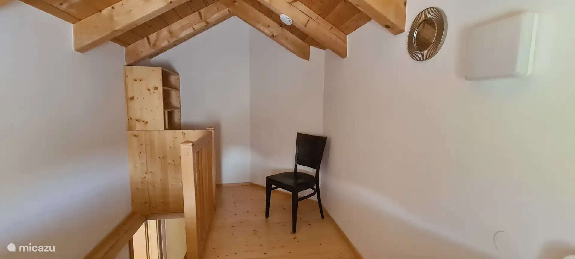 Attic room with cupboard space.