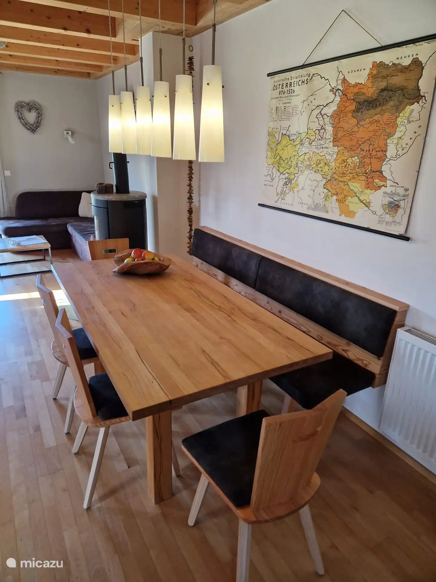 Dining room with sofa and chairs new Oct. 2024