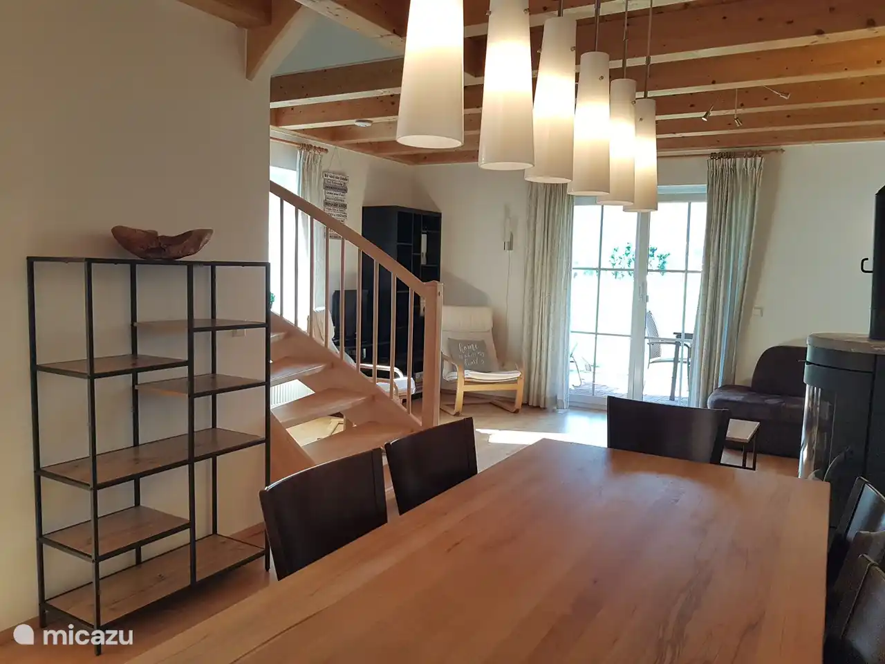 Photo from the kitchen to the living room.
TV (possibly. Dutch channels), 2 relax chairs and a corner (sleeping) sofa. 