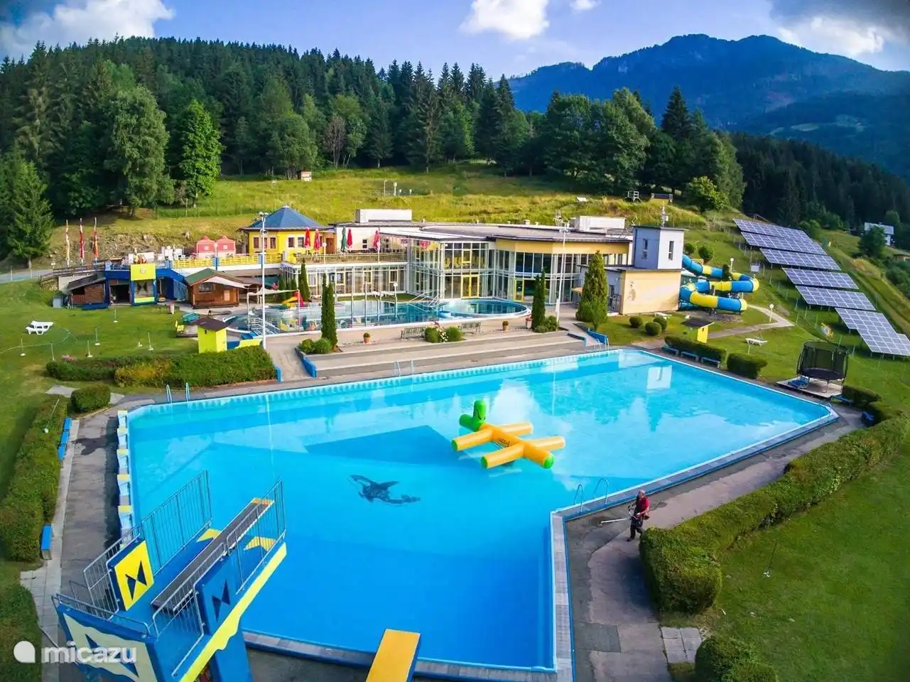 Swimming pool both indoor and outdoor pool with sunbathing lawn in Kötschach (sauna)