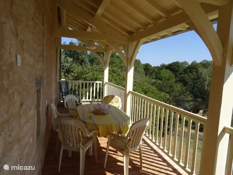 Beautiful veranda of the Gite in Perigoord style with stunning views over the valley