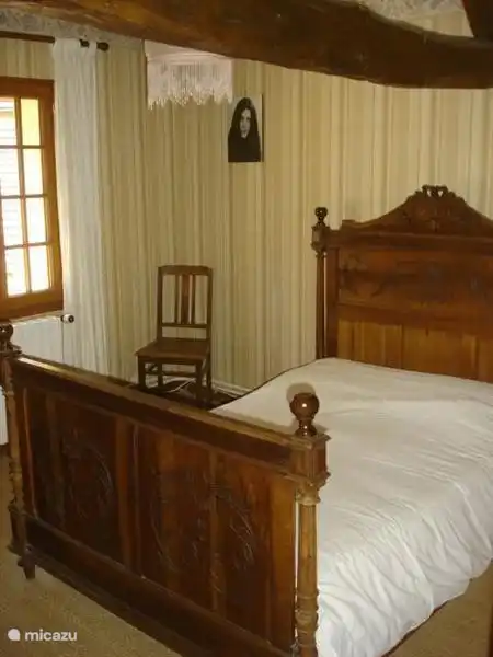 Bedroom 2 upstairs with antique bed frams