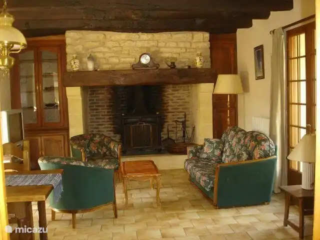 The living room with large fireplace