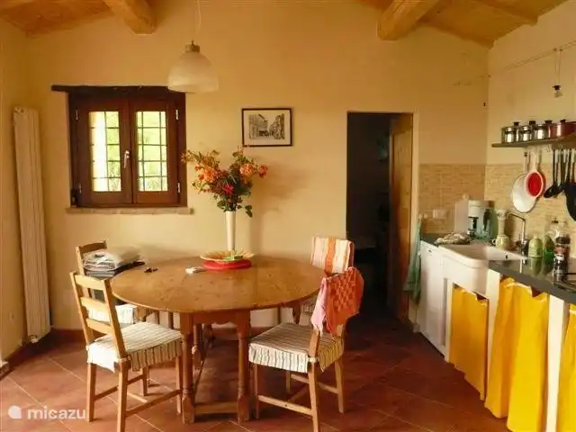 The cozy dining room with garden doors