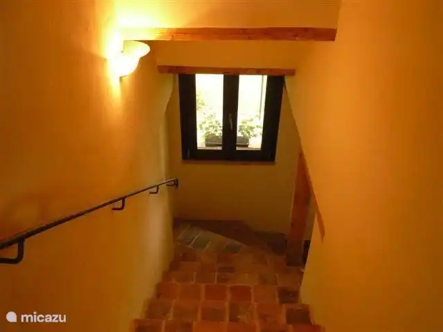 Stairs to 2 romantic bedrooms upstairs